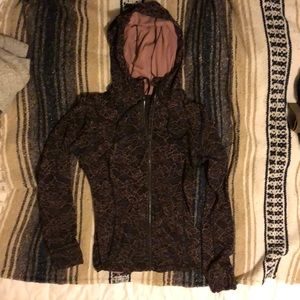 Lululemon hooded jacket. digital floral landscape.